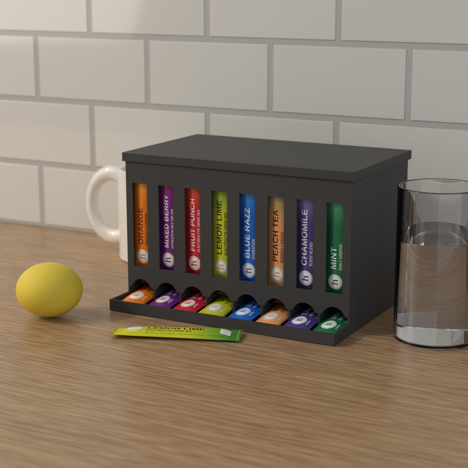 Eight slot drink packet organizer loaded with slim flavor sticks on a kitchen counter next to a mug and a glass of water